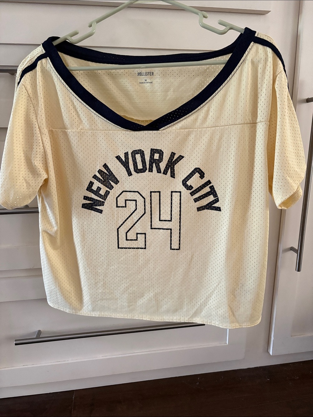Hollister Cream Mesh V-Neck Tee with Navy Trim and New York City 24 Graphic